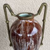 Two large stoneware vases with bronze fittings.