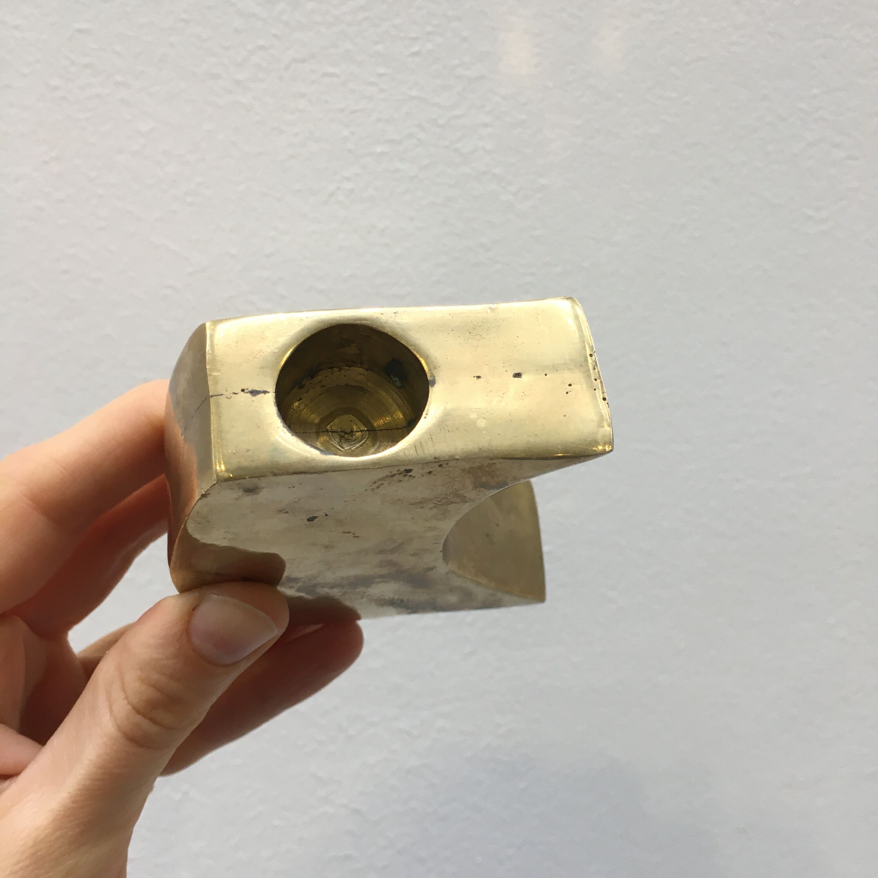 Pair of bronze candle holders by Monique Gerber