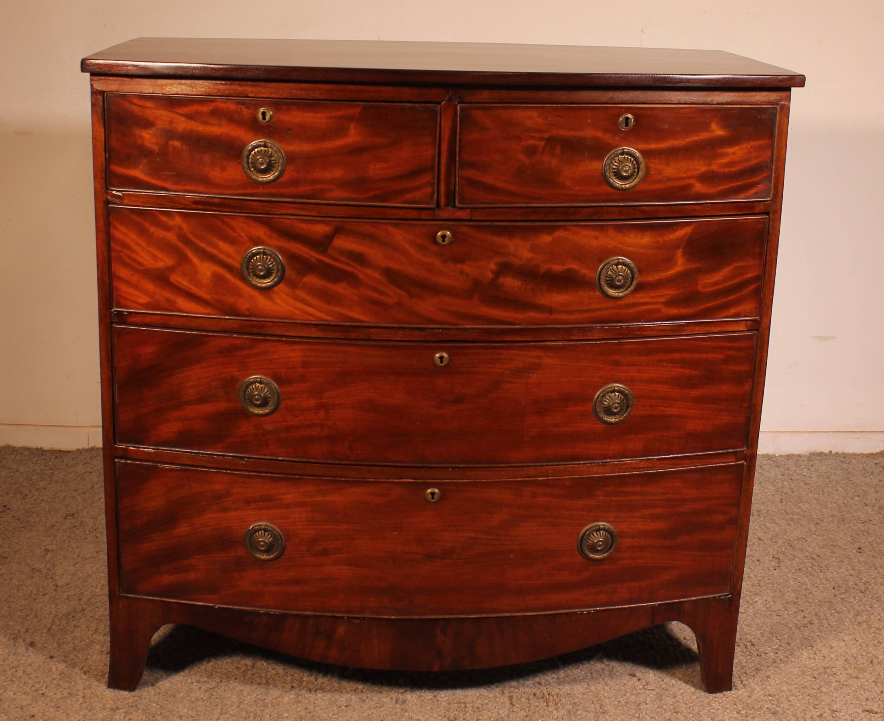 Regency period bombé commode in mahogany