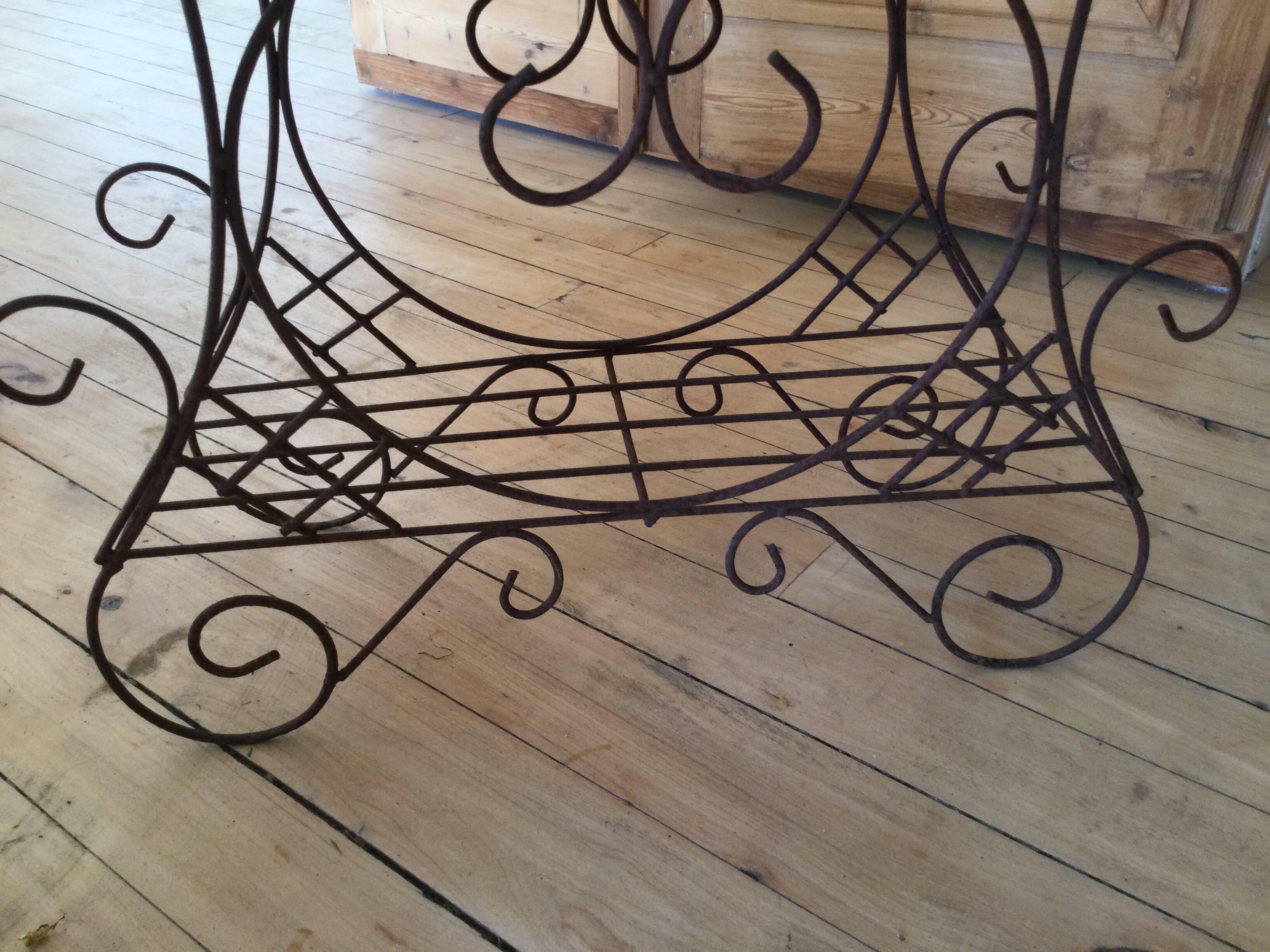 Antique iron plant stand