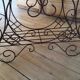 Antique iron plant stand