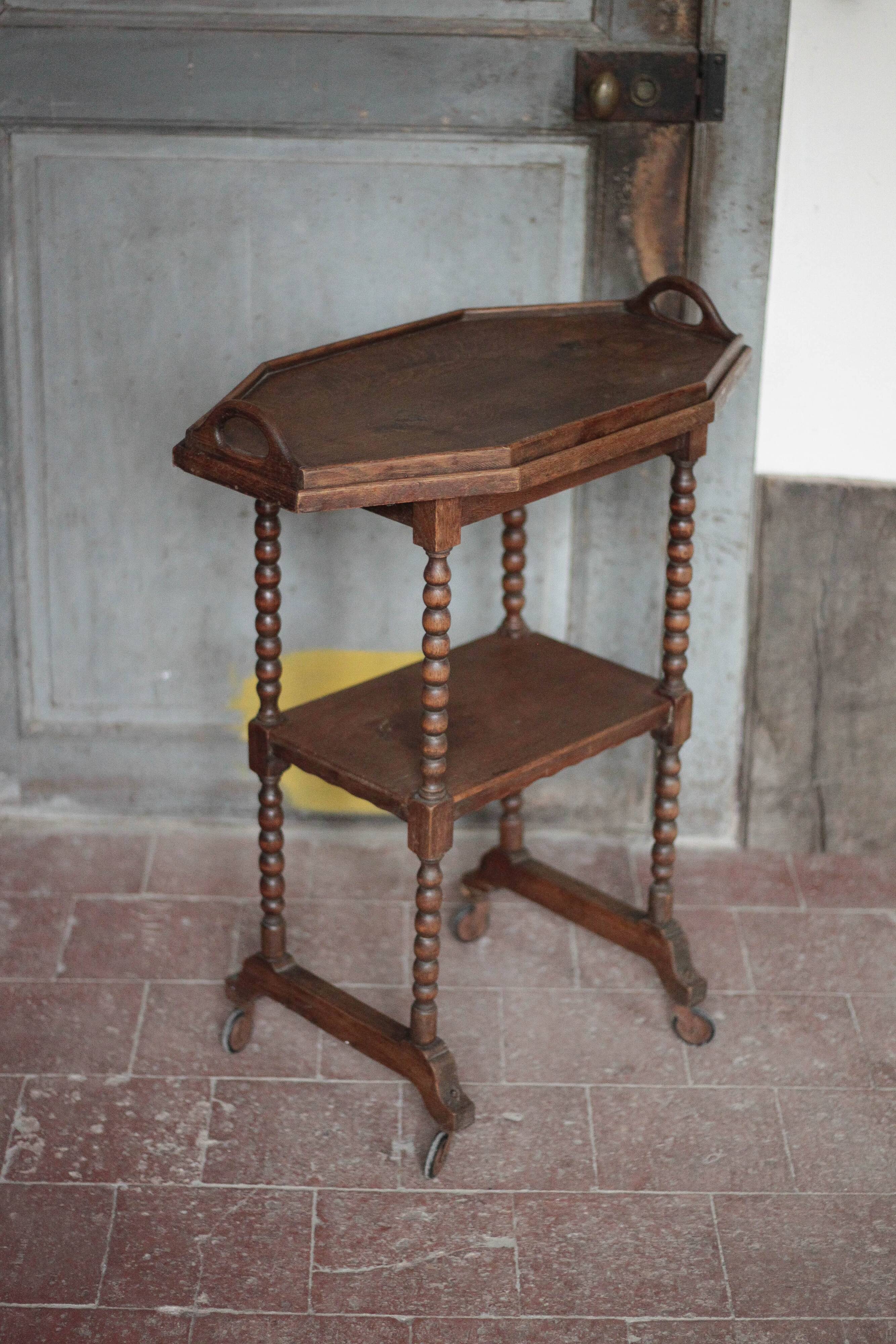 Vintage turned wood dessert trolley, wheeled table with removable top.