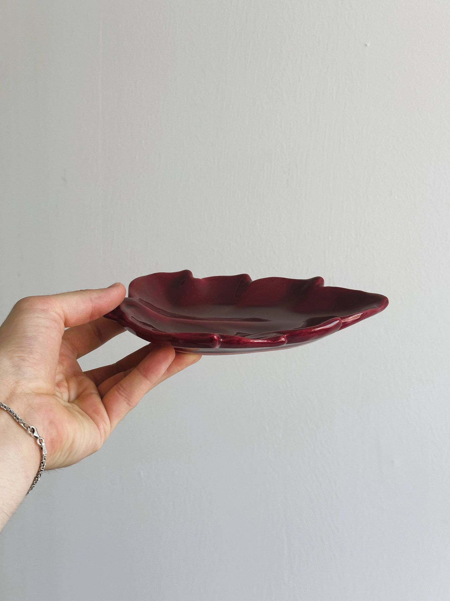 Red ceramic butter dish with knife