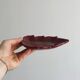 Red ceramic butter dish with knife