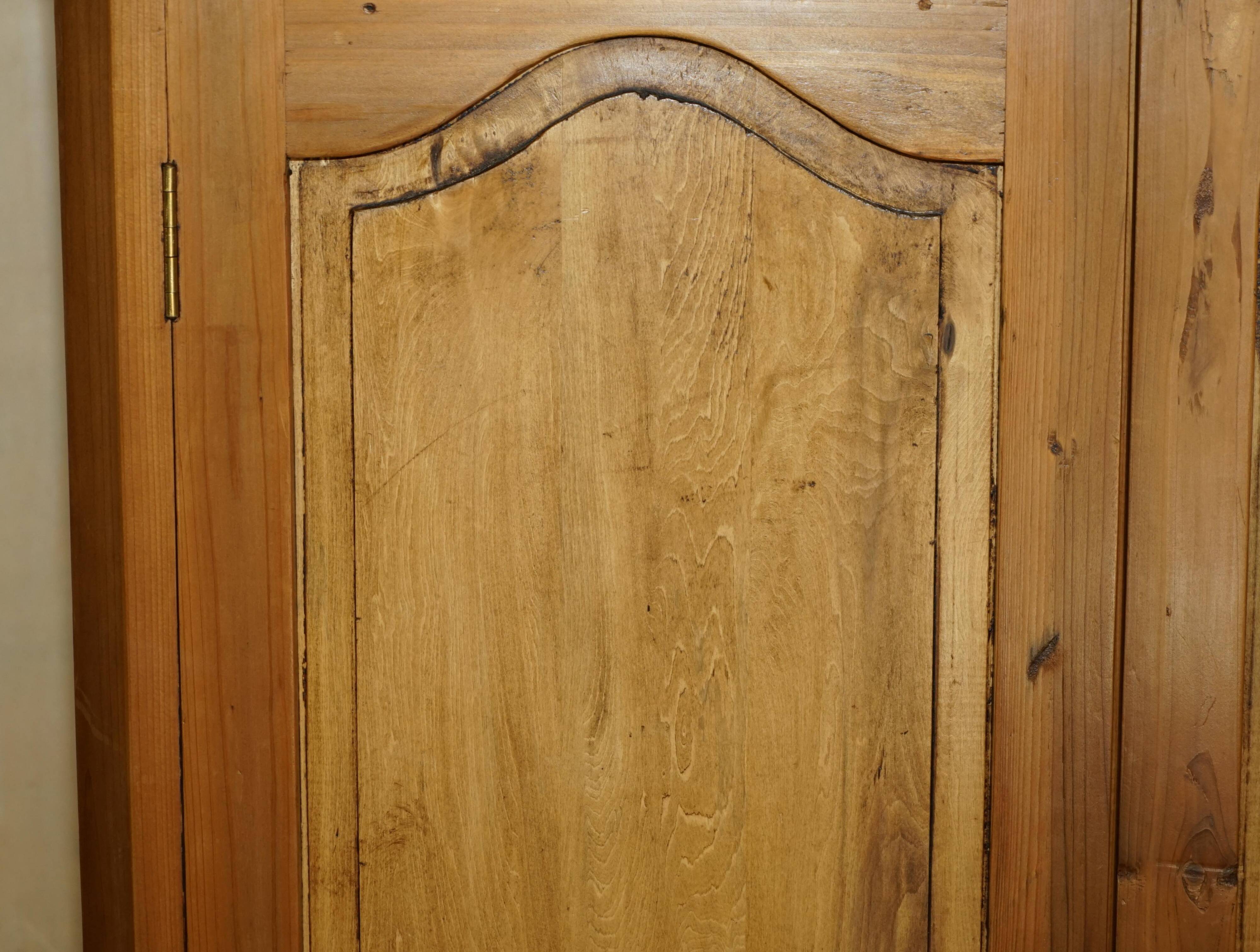 Vintage hand-carved wardrobe in Art Nouveau style.