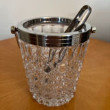 Ice bucket with its pliers