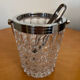 Ice bucket with its pliers