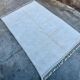 Tapis artisanal blanc