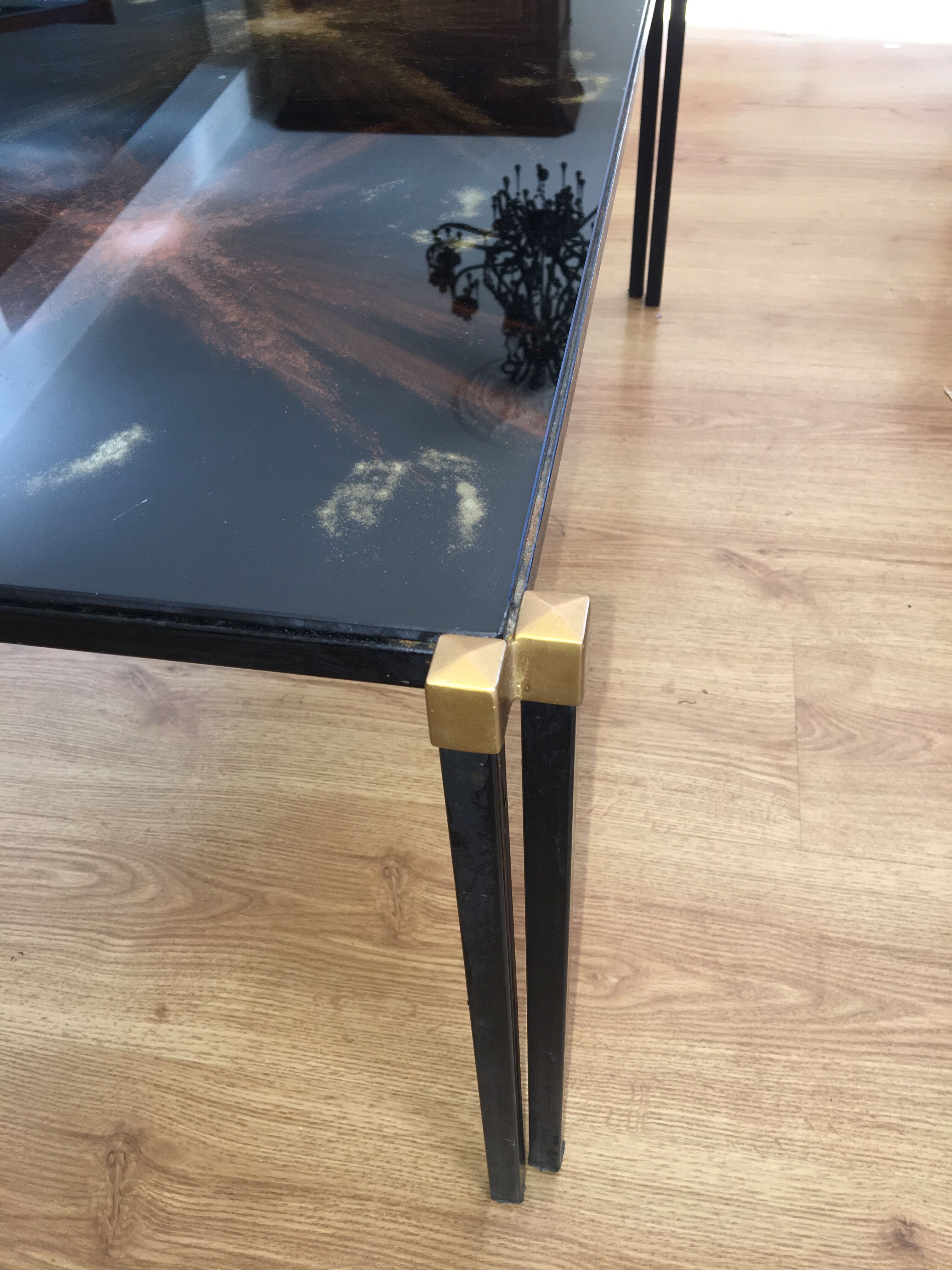 Glass coffee table by Lasco eglomisé and iron/iron gold. signed