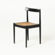 Mid-century dining chair in black laquered wood and cane