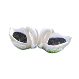 Swan-shaped garden vases in reconstituted stone