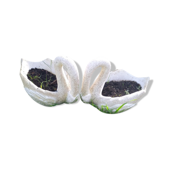 Swan-shaped garden vases in reconstituted stone