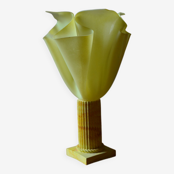 Lamp draped on column