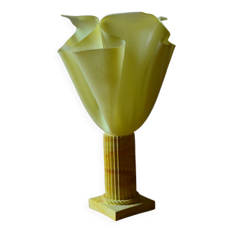 Lamp draped on column