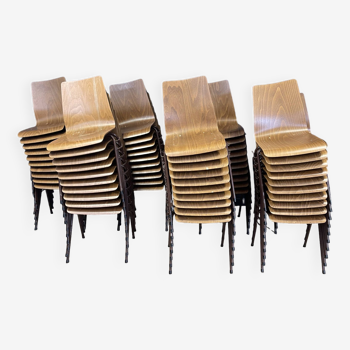 Set of 68 straight design chairs in wood and brown steel base from the 70s Netherlands