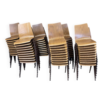 Set of 68 straight design chairs in wood and brown steel base from the 70s Netherlands