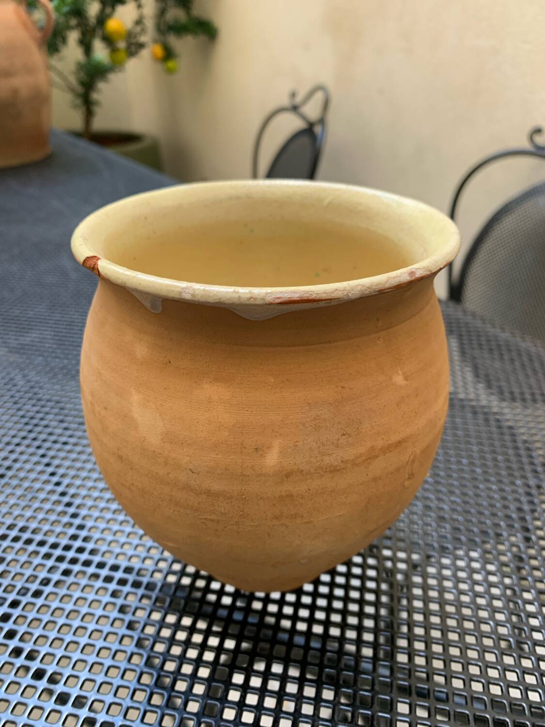 Pair of terracotta and ceramic pots