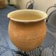 Pair of terracotta and ceramic pots