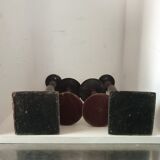 Two pairs of patinated brass candle holders
