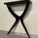 Console from the 1950s in ebonised wood and green marble.