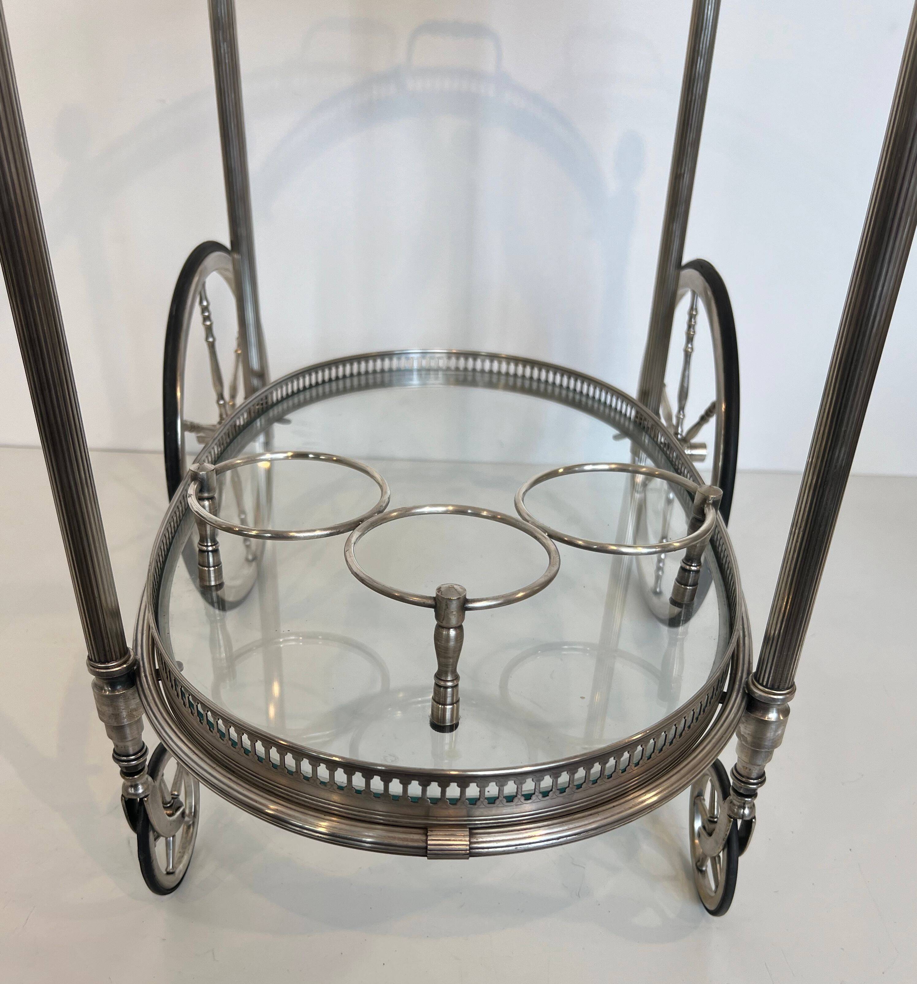 Oval silver-plated brass trolley from Maison Baguès.