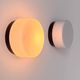 Pair of vintage wall lights in black Bakelite and frosted opal glass, France 1970.
