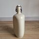 Beige stoneware hot water bottle