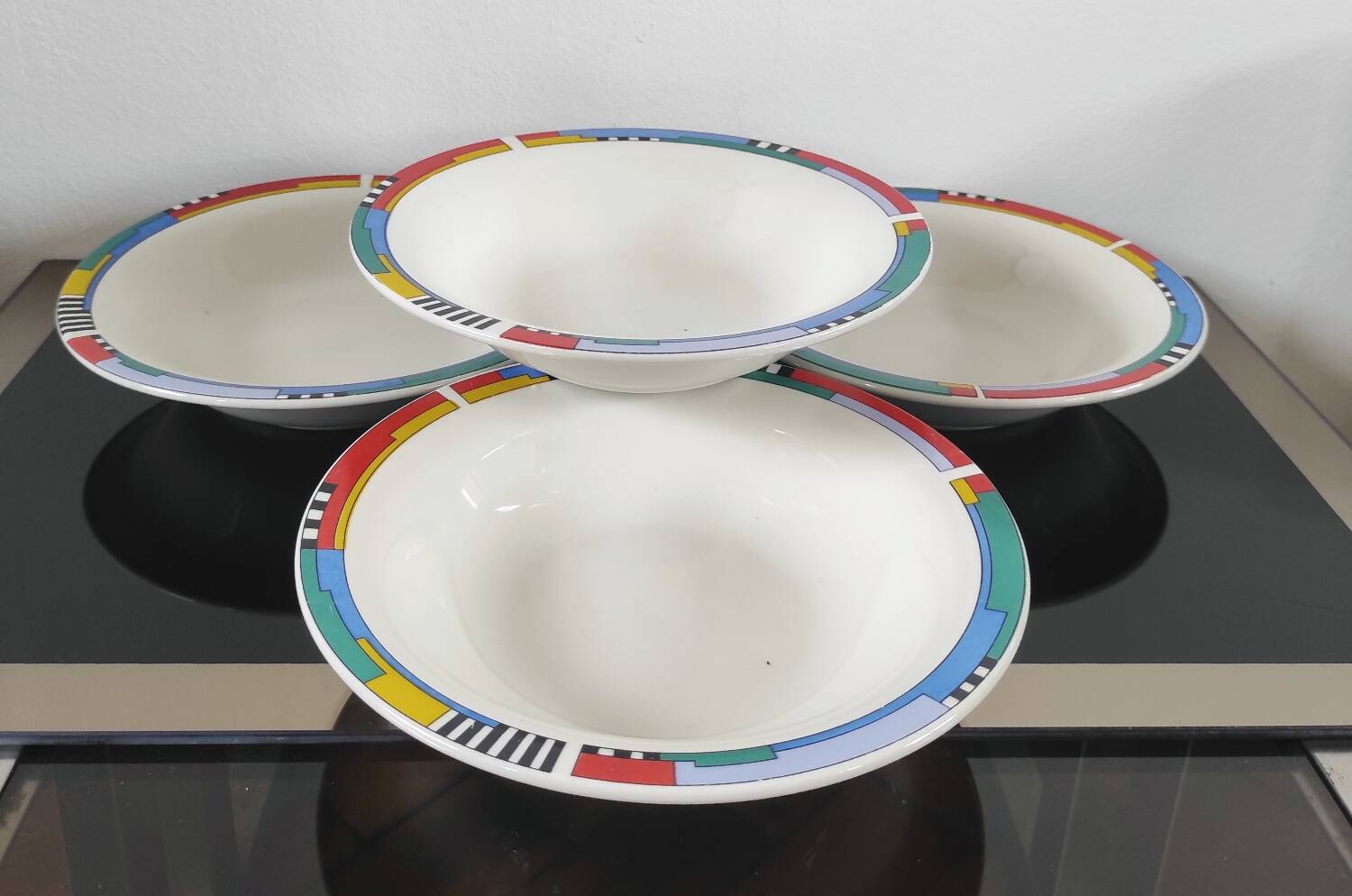 Set of 4 vintage Memphis style deep plates.