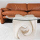 A Vintage White Stone Coffee Table with Glass Table Top