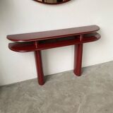 Red lacquered console and its mirror from the 80s