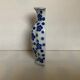 Bouquet vase blue flowers