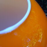 Orange glass globe, 1970