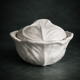 Old covered pot in 19th-century faience with cabbage decoration.