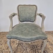 Louis XV style cabriolet armchair in patinated wood and velvet