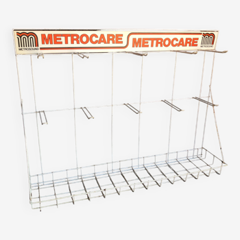 Etagère publicitaire Metrocare en métal blanc, logo orange, années 70/80