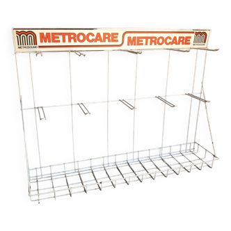 Etagère publicitaire Metrocare en métal blanc, logo orange, années 70/80