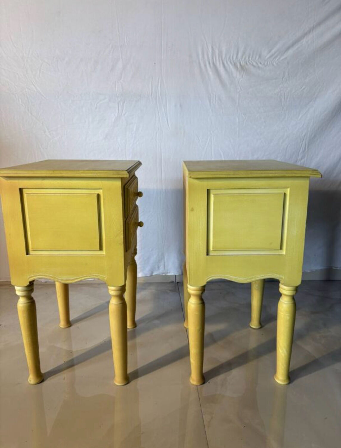 Pair of vintage carved wooden bedside tables.