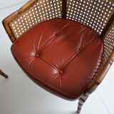 Pair of armchairs in walnut and antique cane, 19th century