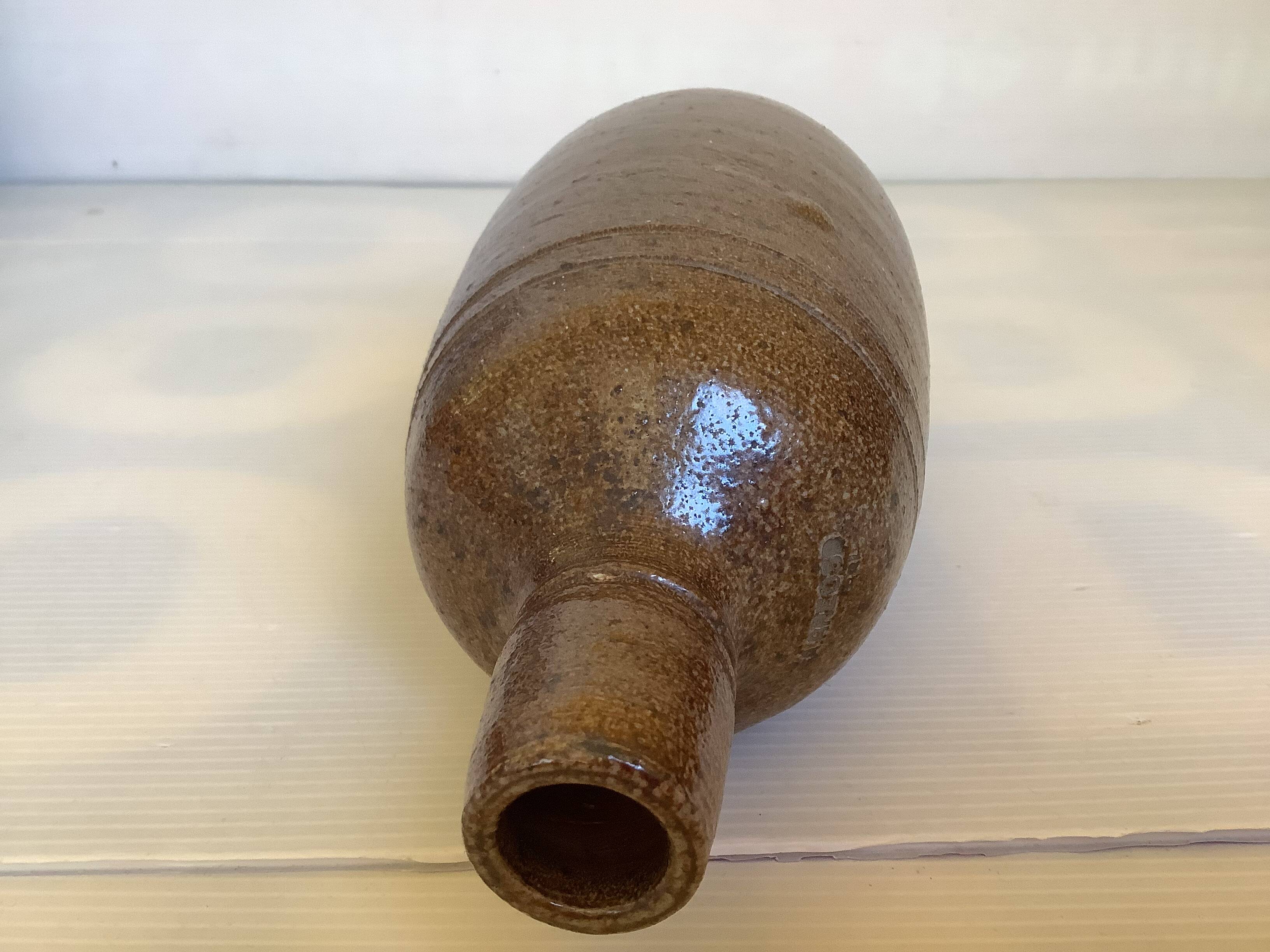 Brown stoneware bottle