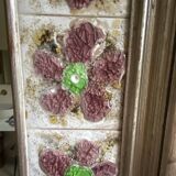 Large square ceramic mirror with floral decoration.