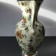 Ancient Delft vase with white ceramics decor vintage flowers