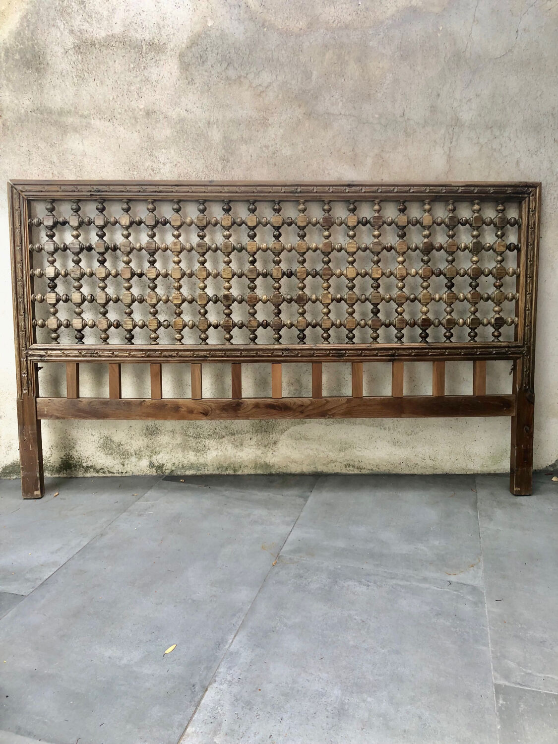 Carved wooden headboard