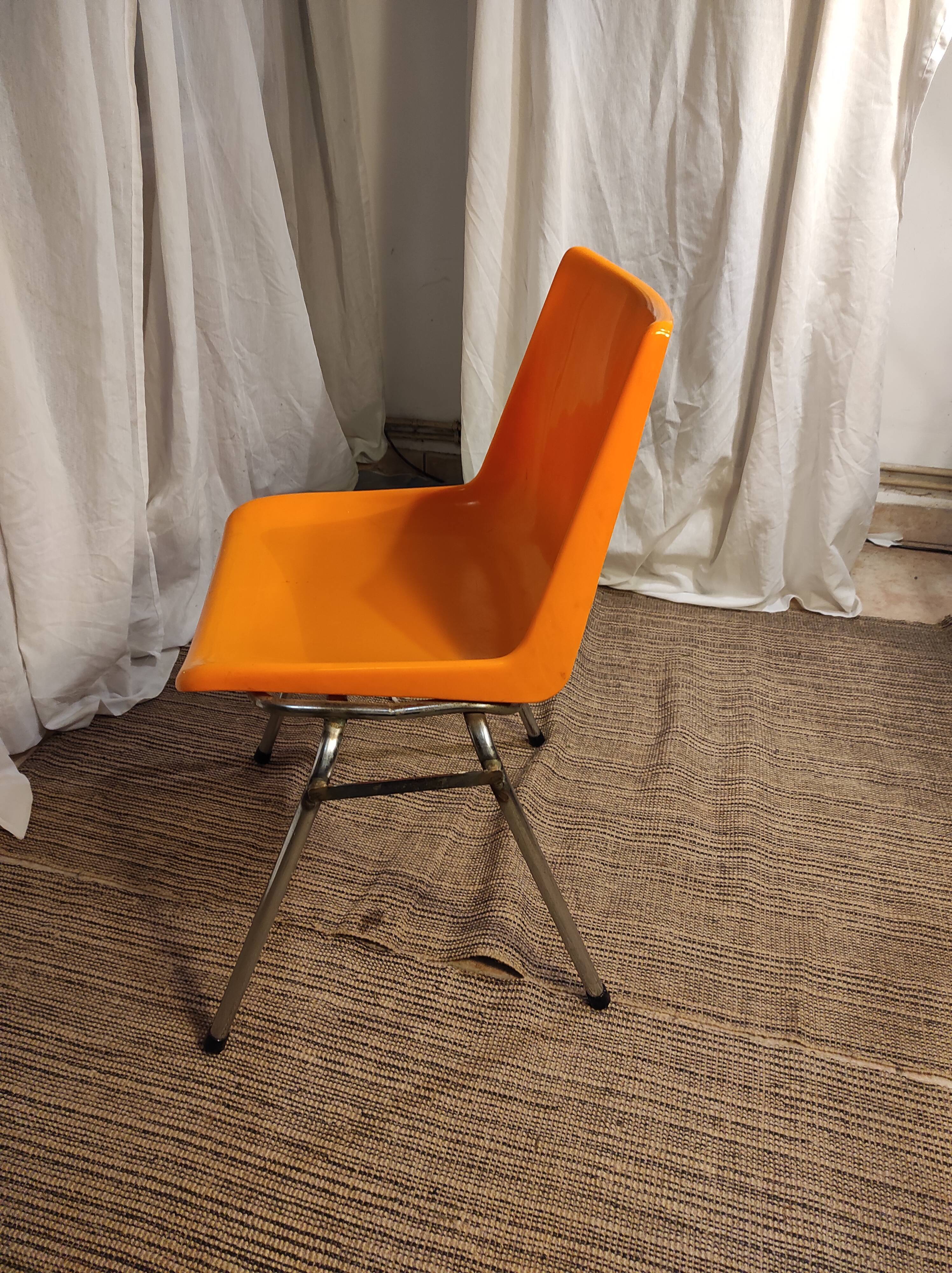 Orange plastic chair 1970