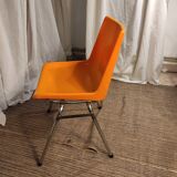 Orange plastic chair 1970