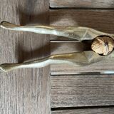 Walnut breaker in the shape of women's legs golden brass vintage