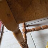 Small footrest bench in bohemian style.