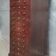 Vintage Drawer Cabinet with Dark Patina and Stenciled Letters