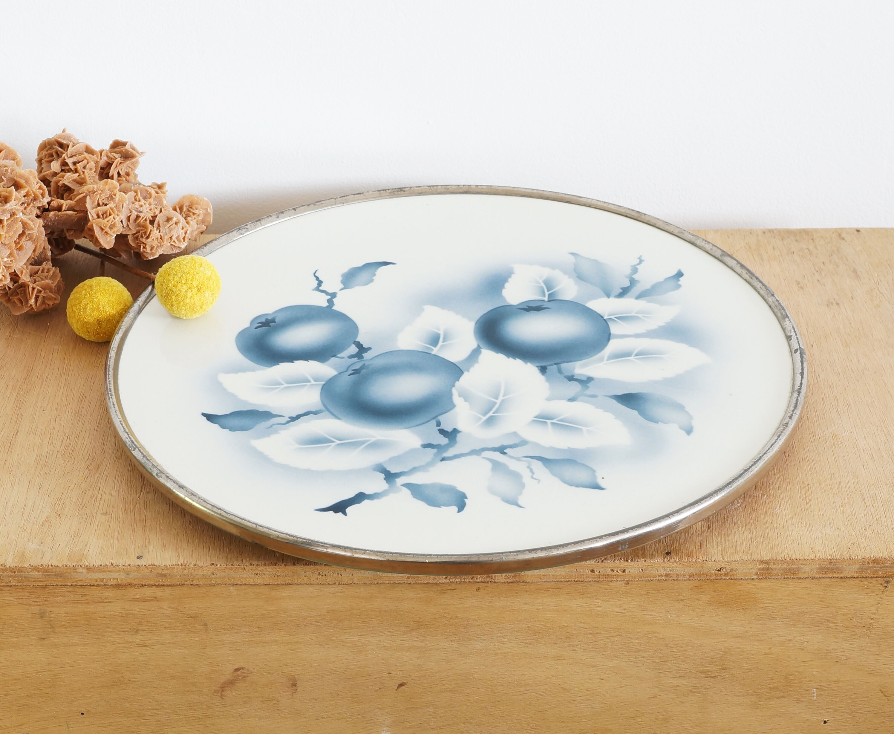 Round earthenware and metal trivets in the 30s or 40s