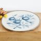 Round earthenware and metal trivets in the 30s or 40s