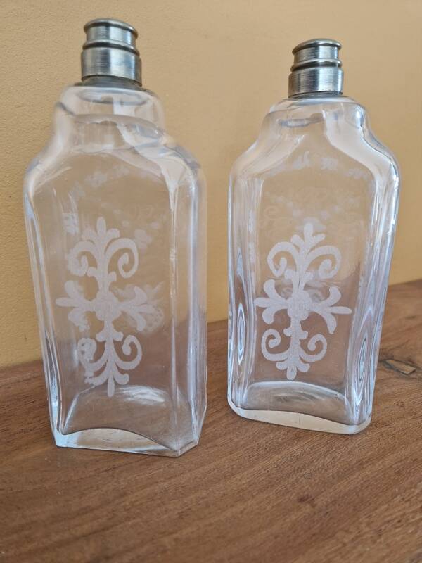 Pair of old engraved and frosted glass bottle vases.